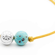 Dulgero Orb Bracelet: Handcrafted Turquoise Gemstone and Silver Logo Bead