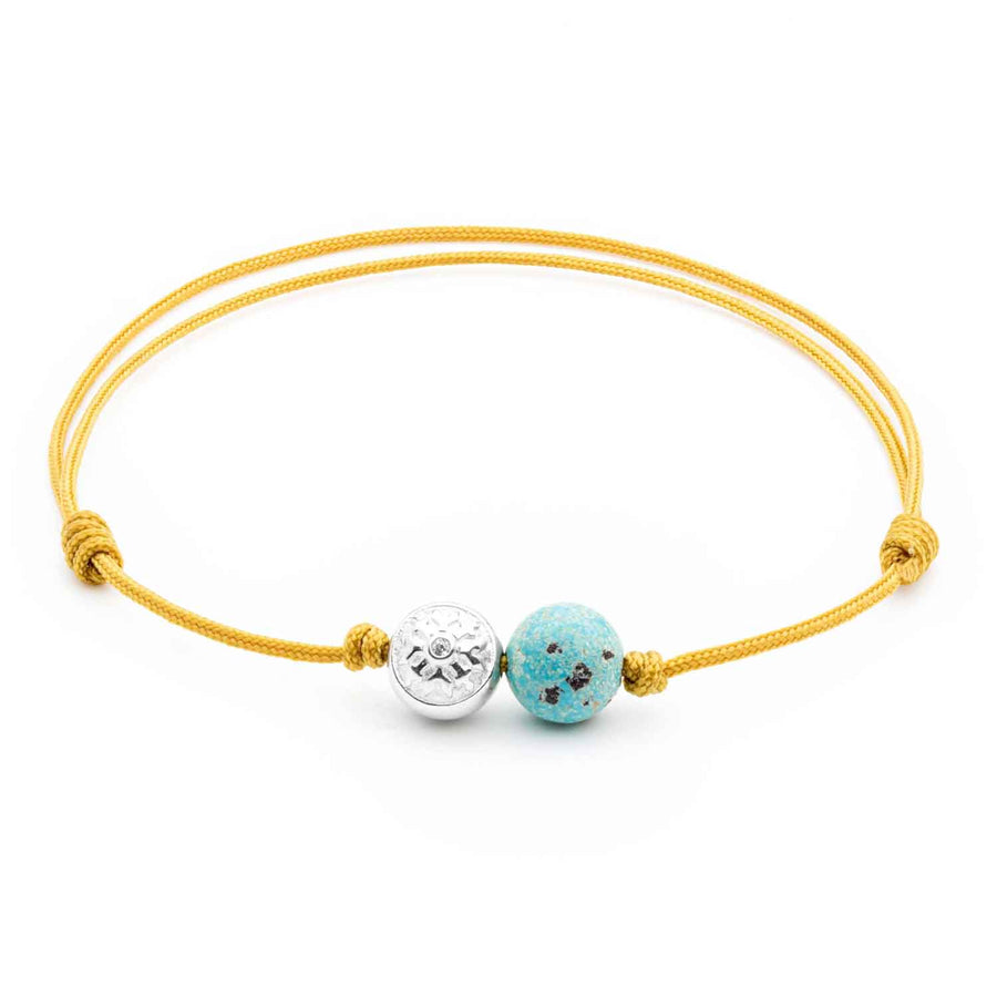 Dulgero Orb Bracelet: Handcrafted Turquoise Gemstone and Silver Logo Bead