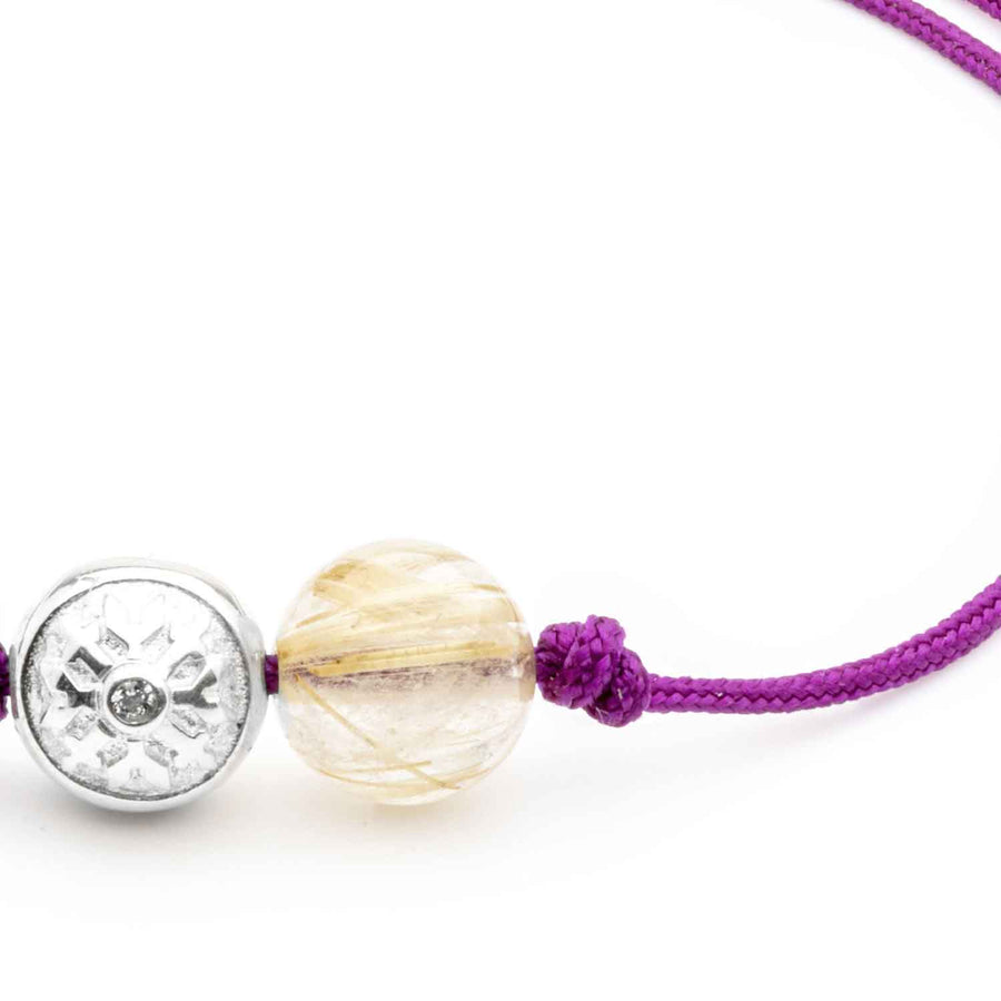 Dulgero Orb Bracelet: Handcrafted Golden Rutilated Quartz Gemstone and Silver Logo Bead