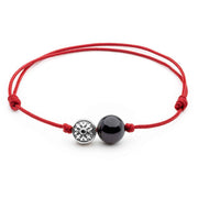 Dulgero Orb Bracelet: Handcrafted Black Tourmaline Gemstone and Silver Logo Bead